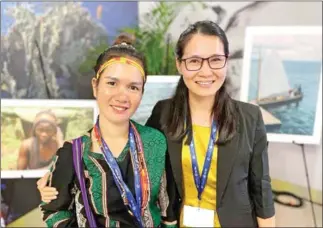  ?? WCS CAMBODIA ?? Koeung Navy (left) makes history at COP28 during a UN climate summit as the first individual from Cambodia’s indigenous Bunong community to attend the event, on December 4.