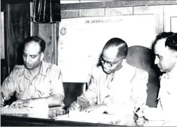  ??  ?? 1947: Dr GM Naicker, Dr AB Xuma and Dr YM Dadoo signing the Joint Declaratio­n of Co-operation known as the ‘Three Doctors’ Pact’.