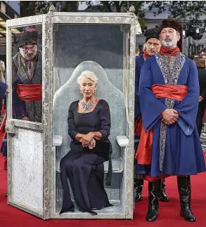  ??  ?? Helen Mirren arrives by sedan chair for Catherine The Great premiere yesterday
