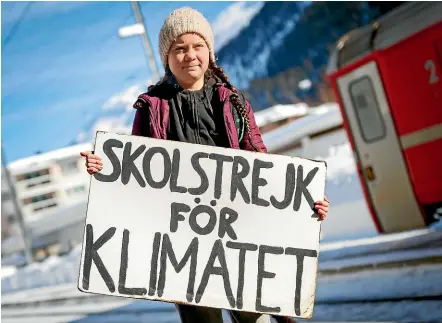 ??  ?? Sixteen-year-old Swedish climate activist Greta Thunberg arrives to attend the 49th Annual Meeting of the World Economic Forum, WEF, in Davos, Switzerlan­d with global warming on her mind.