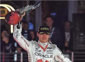  ?? GARY A. VASQUEZ/USA TODAY SPORTS ?? Formula 1 driver Max Verstappen celebrates his victory in the Las Vegas Grand Prix on Nov. 18.