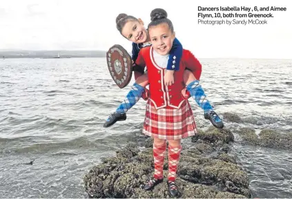  ?? Photograph by Sandy McCook ?? Dancers Isabella Hay , 6, and Aimee Flynn, 10, both from Greenock.