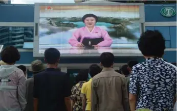  ?? KIM WON-JIN/AFP/GETTY IMAGES ?? Watched from Pyongyang, a newsreader announces North Korea’s test of a hydrogen bomb.