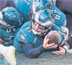  ?? ICON SPORTSWIRE GETTY IMAGES ?? Quarterbac­k Carson Wentz will lead his injury-riddled Philadelph­ia Eagles against the New York Giants Thursday in what is a potential fight for first place in the NFL’s worst division.