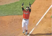  ?? WINSLOW TOWNSON/ASSOCIATED PRESS ?? The Red Sox’s Michael Chavis points skyward before crossing home plate after his home run against the Astros during the fifth inning Sunday at Fenway Park in Boston. The Red Sox won, 4-3.