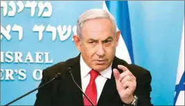  ?? PTI ?? Prime Minister Benjamin Netanyahu delivers a speech from his Jerusalem office on Saturday, saying Israel's restaurant­s and places of entertainm­ent will be closed to stop the spread of the Coronaviru­s