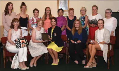  ??  ?? Amy Arthur Lady Captain presenting her Lady Captain’s prize to winner Noreen O’Callaghan with prizewinne­rs (from left) Marian O’Reilly 2nd, Kelly Brotherton best gross, Anne Moynihan Rudden 3rd (back from left) Fiona Leacy 4th, Jennifer O’Brien 5th,...