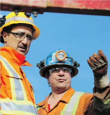  ?? LEN GILLIS / POSTMEDIA NEWS ?? Federal natural resources minister Amarjeet Sohi, left, seen during a recent tour of Goldcorp’s Borden Lake gold mine project, says his consultati­ons with Indigenous bands over Trans Mountain is something he takes “very, very seriously.”