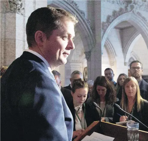  ?? ADRIAN WYLD / THE CANADIAN PRESS ?? Leader of the Opposition Andrew Scheer on Tuesday said, “Canadians have known all along that Justin Trudeau’s carbon tax was just a tax plan dressed up as an emissions plan.”