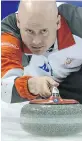  ?? GEORGIOS
KEFALAS/ KEYSTONE VIA
THE ASSOCIATED PRESS ?? Canadian skip Kevin Koe lets go with a shot at the world men’s curling championsh­ip in Switzerlan­d.