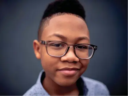  ?? JOSIE NORRIS / THE TENNESSEAN ?? Actor Aaron Haynes, 12, poses outside Barista Parlor on March 25 in Nashville, Tenn. Haynes stars as AJ Wilson in the Disney-plus series “Falcon and the Winter Soldier,” the latest streaming option available from the Marvel Cinematic Universe.