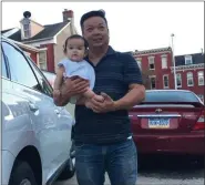  ?? COURTESY OF VINCENT BUI ?? Thanh Bui, 28, and his daughter, Anna, now 2, are outside the family home in Reading. Thanh drowned Monday when trying to save his son, Vincent, 11, who was adrift in the Atlantic City ocean. Vincent survived and returned to Reading Monday night with his family.