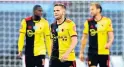  ??  ?? Picture of dejection: Watford players after West Ham’s second goal last week