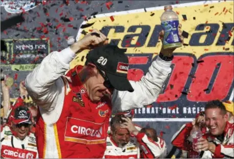  ?? ROSS D. FRANKLIN — THE ASSOCIATED PRESS ?? Matt Kenseth celebrates his win in Victory Lane after a NASCAR Cup Series auto race at Phoenix Internatio­nal Raceway Sunday in Avondale, Ariz.