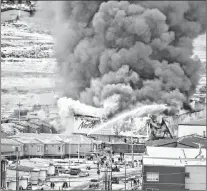  ?? CP PHOTO ?? A fire burns at a Northmart store in Iqaluit, Nunavut on Thursday, Nov. 8.