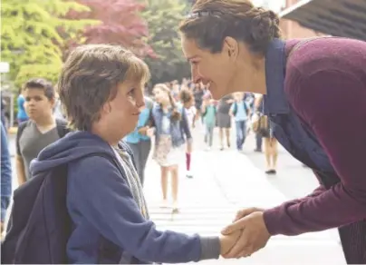  ??  ?? Jacob Tremblay as Auggie, and Julia Roberts as Isabel in “Wonder.”