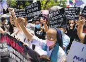  ?? AARON FAVILA AP ?? A Catholic nun protests against Ferdinand Marcos Jr. in Pasay, Philippine­s, on Friday.