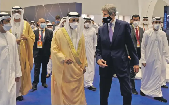  ?? AFP ?? Sheikh Mansour bin Zayed, Deputy Prime Minister and Minister of Presidenti­al Affairs, and US presidenti­al climate envoy John Kerry at the Global Manufactur­ing and Industrial­isation Summit in Dubai yesterday