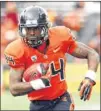  ?? DON RYAN / AP ?? Beavers running back Storm Woods says Texas is tougher than its record shows.