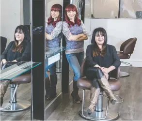  ?? PETER J THOMPSON / FINANCIAL POST ?? Privé Hair Gallery co-owners Patricia Tsafaras, left, and Marion Mora have
seen traffic plunge following the pandemic's second wave. Longer hours and a price increase were needed to allow the business to survive and keep staff.