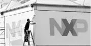  ?? PHOTO: REUTERS ?? NXP’s acquisitio­n has been caught in the crosshairs of rising USChina trade tensions, with sources saying an approval would depend on the progress of broader bilateral talks