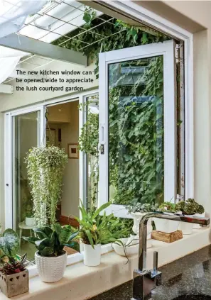  ??  ?? The new kitchen window can be opened wide to appreciate the lush courtyard garden. STOCKISTS Incanda 021 914 5832, incanda.co.za MRP Home 0800 212 535, mrphome.com The Machine Shop 082 734 6246