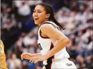  ?? Jessica Hill / Associated Press ?? UConn’s Azzi Fudd during a game against Tennessee on Feb. 6. Fudd’s parents helped her navigate her freshman season, which included injuries, adversity and a Final Four appearance.