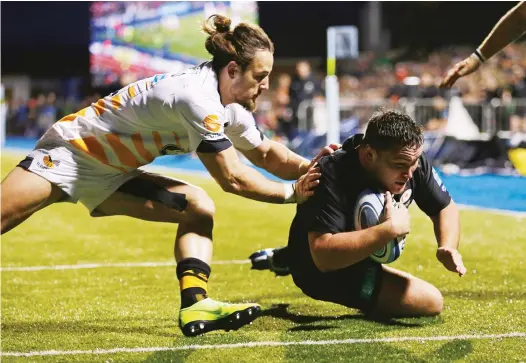  ?? PICTURES: Getty Images ?? Breaching the line: Jamie George touches down for Saracens despite the efforts of Michele Campagnaro