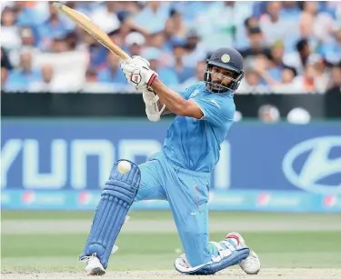  ??  ?? MASTERFUL: Indian opener Shikhar Dhawan destroyed the Proteas attack in Melbourne as he had done in Cardiff two years ago