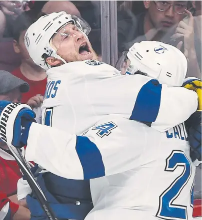  ?? RYAN REMIORZ / THE CANADIAN PRESS ?? Tampa Bay Lightning centre Steven Stamkos, left, scored his first goal of the NHL playoffs on Sunday night.