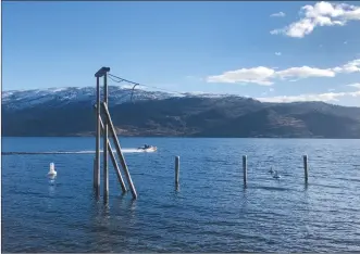  ??  ?? RON SEYMOUR/Westside Weekly
A motorboat skims across Okanagan Lake last week. Temperatur­es in Kelowna are on a record-warm pace with the mildest day so far this month not much cooler than some days last June.