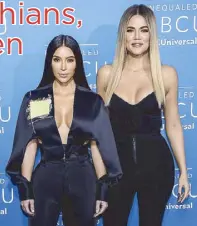  ?? —AP photo ?? Kim Kardashian (left) and sister Khloe