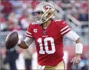  ?? JOSIE LEPE — THE ASSOCIATED PRESS ?? 49ers quarterbac­k Jimmy Garoppolo against the Arizona Cardinals during the second half in Santa Clara on Sunday.