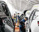  ?? Justin Kaneps / New York Times file ?? Shortages in supplies like semiconduc­tors have forced several major American auto plants to close or scale back production.