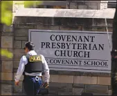 ?? JOHN AMIS / ASSOCIATED PRESS ?? A police officer walks by an entrance to The Covenant School on Monday after a shooting in Nashville, Tenn.