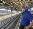  ?? JENNA FRYER / AP ?? Roger Penske looks over the track Thursday at Indianapol­is Motor Speedway. He has spent six months transformi­ng the facility.