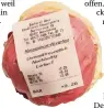  ?? FOTO: DPA ?? Eine Bäckerei in Bayern verkauft Krapfen mit Kassenbons aus Zuckerguss. Bons aus Papier muss sie trotzdem drucken.