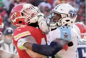  ?? AP Photo/Charlie Riedel, File ?? Tennessee Titans safety Kevin Byard blocks Kansas City Chiefs running back Anthony Sherman during the first half Dec. 18, 2016, in Kansas City, Mo. The Chiefs and Titans meet in a wild-card playoff game on Saturday.