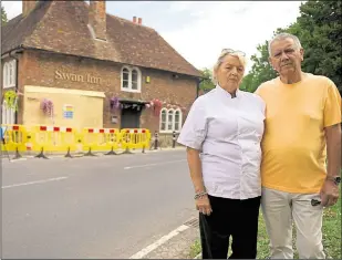  ?? Picture: Barry Goodwin ?? Husband-and-wife team Ray and Ann Perkins - who run the 16th century pub - are currently in Spain but are pictured here in July