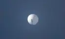  ?? AFP/Getty Images ?? A suspected spy balloon in the sky over Billings, Montana. Photograph: Chase Doak/