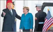  ?? AFP ?? US President Donald Trump greets German Chancellor Angela Merkel at the White House in Washington on Friday.