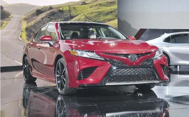  ?? DEREK MCNAUGHTON / DRIVING. CA ?? The 2018 Toyota Camry features a new Sport Mode setting that allows the driver to execute smooth yet quick “gear” shifts.