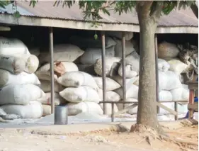  ??  ?? Sacks of rice at the mill.