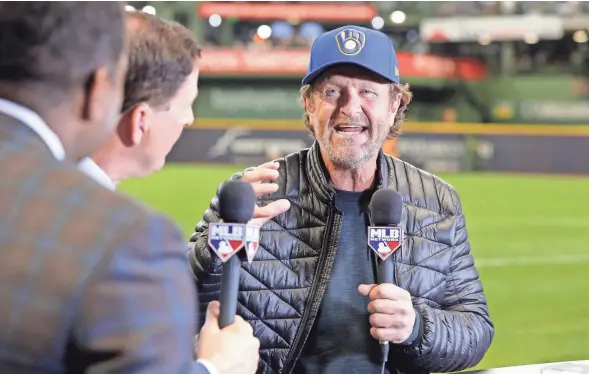  ??  ?? Former Brewer Robin Yount talks to the MLB Network before the game.