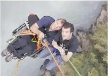  ??  ?? An episode featuring Rick Mercer and Canadian wheelchair athlete Rick Hansen bungee jumping in Whistler, B.C., aired in 2009.
