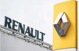  ?? KIRILL KUDRYAVTSE­V/GETTY-AFP ?? The Renault Group logo stands before its auto plant in Moscow. Russia will take control of the French car manufactur­er’s operations in the country.