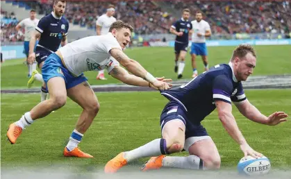  ??  ?? Big finish: Stuart Hogg scores Scotland’s fourth try
Minozzi 7.5; Benvenuti 6 (Hayward 59, 6), Bisegni 7, Castello 6 (Canna 74, 6), Bellini 6.5; Allen 8, Violi 7 (Palazzani, 67, 6), Lovotti 6 (Quaglio 59, 6), Ghiraldini 7 (Fabiani 77, 6), Ferrari 7.5...