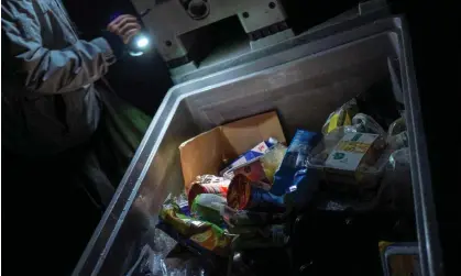  ?? Photograph: John MacDougall/AFP/Getty Images ?? ‘A student we talked to remarked that they dumpster dived a lot to survive.’