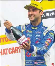  ??  ?? Andrew Jordan celebrates his second victory of the season at Silverston­e