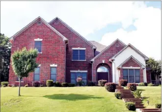  ?? CODY GRAVES/Arkansas Democrat-Gazette ?? This home, located at 18 Alban Lane in Little Rock, has about 3,862 square feet and is listed for $417,900 with Jean Noell of Coldwell Banker RPM, Midtown. Today’s open house is from 2 to 4 p.m. For more informatio­n, call Noell at 501-350-3297.